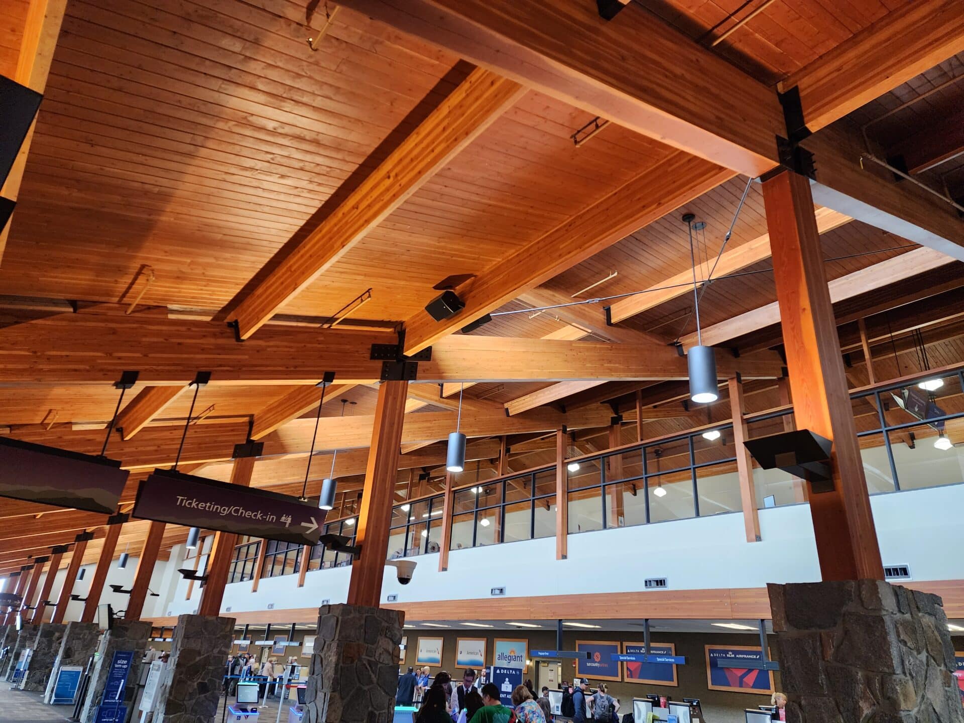 QB Corporation's Ridge and Rafter Glued laminated timber and Columns at Bozeman Yellowstone International Airport.